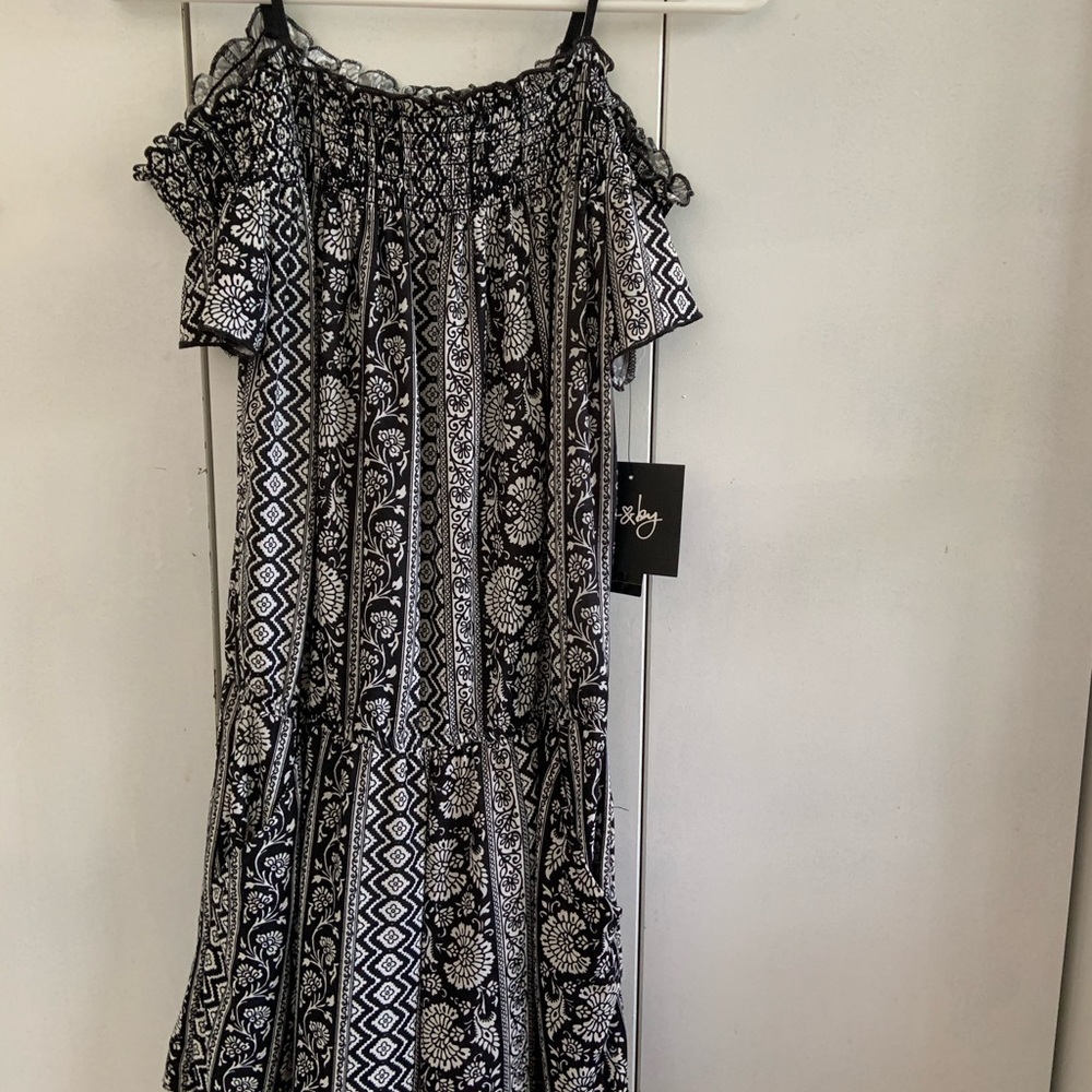Off the shoulder black and white romper